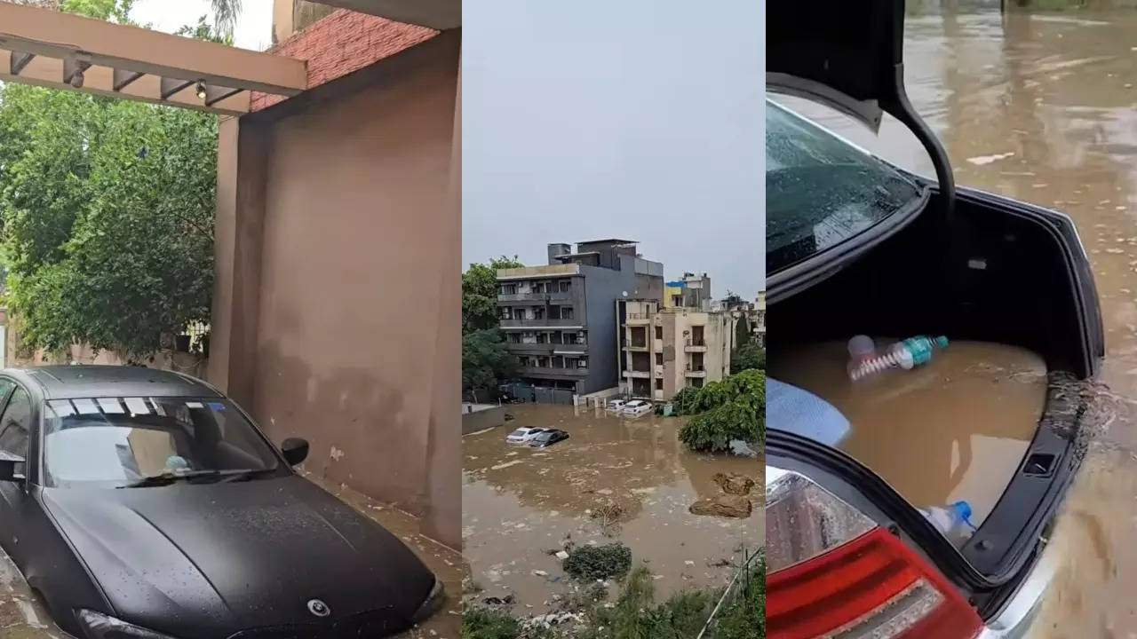Watch: Two-hour rain submerges Merc, BMW among other cars in Gurgaon, video goes viral Watch: Two-hour rain submerges Merc, BMW among other cars in Gurgaon, video goes viral