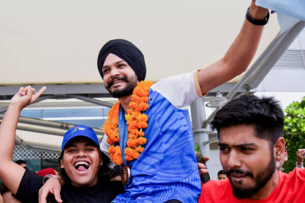 Paris Olympics medallist Sarabjot Singh welcomed to the beat of dhols at Delhi airport – Watch | Paris Olympics 2024 News