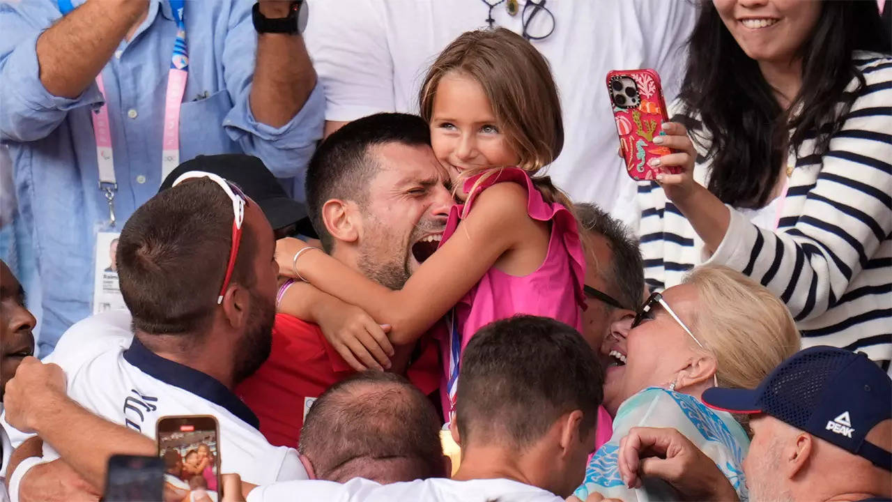 Viral Video: Tearful Novak Djokovic hugs daughter, family after claiming first-ever Olympic gold | Paris Olympics 2024 News Viral Video: Tearful Novak Djokovic hugs daughter, family after claiming first-ever Olympic gold | Paris Olympics 2024 News