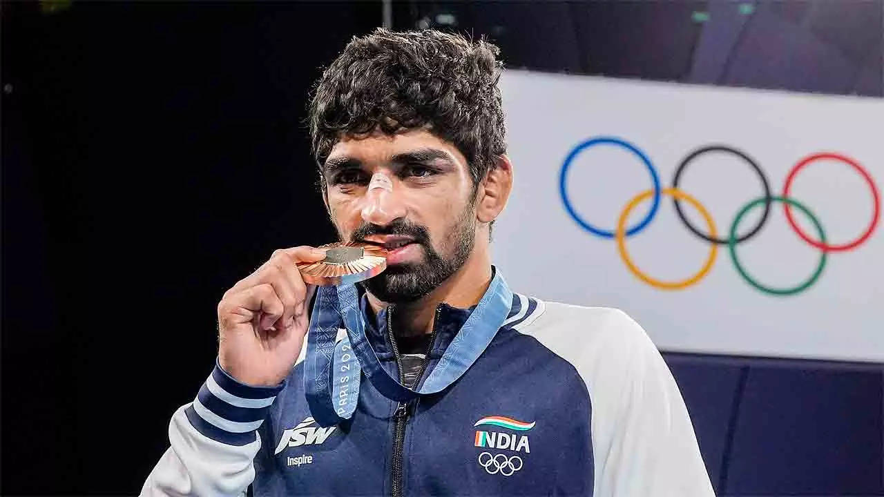 Aman Sehrawat wrestles past adversities to claim glory at Paris Olympics | Paris Olympics 2024 News Aman Sehrawat wrestles past adversities to claim glory at Paris Olympics | Paris Olympics 2024 News