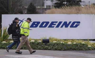 Boeing reports .2 billion quarterly loss ahead of vote by union workers Boeing reports .2 billion quarterly loss ahead of vote by union workers